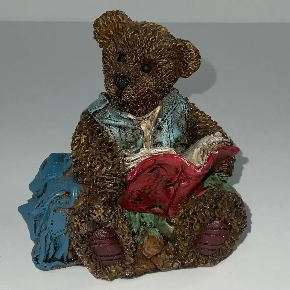 Cornerstone Creations collectible bear with book bag and reading a book.
